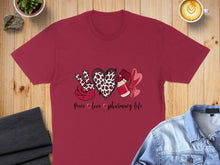 Load image into Gallery viewer, Burgundy t-shirt with "Peace love pharmacy life" and leopard print heart.