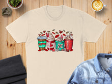 Load image into Gallery viewer, T-shirt graphic with four stylized drinks: a coffee cup, two ice cream cones, and a smoothie cup, decorated with hearts and medical symbols.