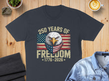 Load image into Gallery viewer, Dark t-shirt with eagle, US flag, and "250 Years of Freedom" text.