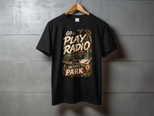 Load image into Gallery viewer, Black t-shirt with "Go Play Radio In The Park" graphic featuring vintage radio.