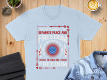 Load image into Gallery viewer, Light blue t-shirt with "You Cannot Separate Peace and Freedom" graphic.