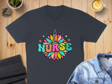 Load image into Gallery viewer, Dark t-shirt with colorful floral "NURSE" text and stethoscope design.