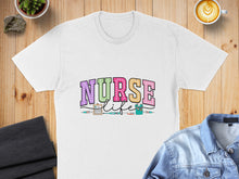 Load image into Gallery viewer, White t-shirt with "NURSE LIFE" text and medical icons.