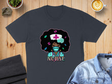 Load image into Gallery viewer, Dark grey t-shirt with "Nurse" text and a cartoon nurse with an afro and mask.