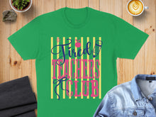 Load image into Gallery viewer, Green t-shirt with text "Tired Teachers Club" in pink lettering.