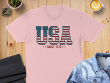 Load image into Gallery viewer, Pink t-shirt with "USA" in American flag letters, "since 1776" below.