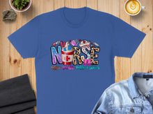 Load image into Gallery viewer, Blue t-shirt with "NURSE" text and coffee, scrubs, rubber gloves graphics.
