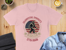 Load image into Gallery viewer, Pink t-shirt with "CELEBRATING AMERICA'S 4TH JULY SEMIQUINCENTENNIAL 1776-2026" text and Bigfoot graphic.