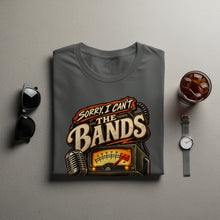 Load image into Gallery viewer, Gray t-shirt with "Sorry, I Can't. The Bands" text and graphic.