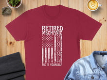Load image into Gallery viewer, Maroon t-shirt with distressed American flag mechanic graphic and text.