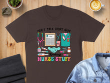 Load image into Gallery viewer, Brown t-shirt with "Can't talk right now, doing nurse stuff" and medical icons.