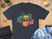 Load image into Gallery viewer, Dark t-shirt with "Nurse" text surrounded by colorful floral illustrations.