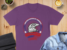 Load image into Gallery viewer, Purple t-shirt with United States of America Independence Day eagle graphic.