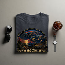 Load image into Gallery viewer, Dark gray t-shirt with graphic of Earth, radio, and text "THE BANDS COME ALIVE".