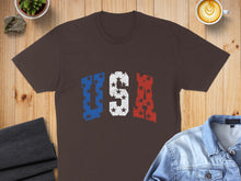 Load image into Gallery viewer, Brown t-shirt with distressed USA text in red, white, and blue stars and stripes.
