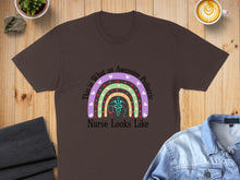 Load image into Gallery viewer, Dark brown t-shirt with colorful rainbow and stethoscope, text "This is What An Awesome Pediatric Nurse Looks Like".