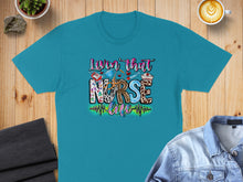 Load image into Gallery viewer, Turquoise t-shirt with "Lovin' that Nurse Life" graphic and medical icons.