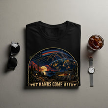 Load image into Gallery viewer, Black t-shirt with a graphic of the Earth, radio, and text "The Bands Come Alive".