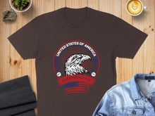 Load image into Gallery viewer, Brown t-shirt with United States of America Independence Day eagle graphic.