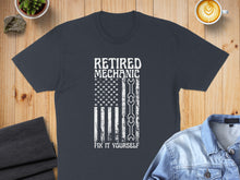 Load image into Gallery viewer, Dark t-shirt with American flag design featuring wrenches and "Retired Mechanic Fix It Yourself."
