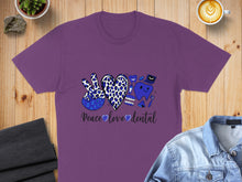 Load image into Gallery viewer, Purple t-shirt with leopard print heart, teeth, and "Peace Love Dental" text.