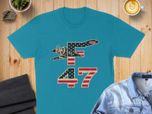 Load image into Gallery viewer, Teal t-shirt with a vintage airplane and the number 47 design.