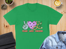 Load image into Gallery viewer, Green t-shirt with peace sign, stethoscope, and syringe graphic and text.