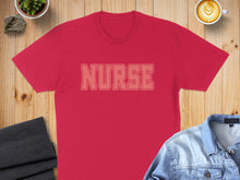 Load image into Gallery viewer, Red t-shirt with "NURSE" text, styled with coffee and denim jacket.