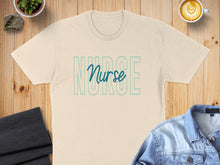 Load image into Gallery viewer, Cream t-shirt with "NURSE" text in teal outlined letters.