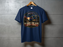 Load image into Gallery viewer, T-shirt with "The Bands Come Alive After Dark" graphic featuring a radio and night sky.