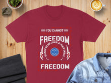 Load image into Gallery viewer, Burgundy t-shirt with "FREEDOM" text and American flag design.