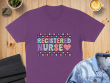 Load image into Gallery viewer, Purple t-shirt with "Registered Nurse" text and heart graphic.