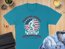 Load image into Gallery viewer, Blue t-shirt with Bigfoot celebrating America's Semiquincentennial 1776-2025.