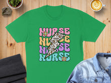 Load image into Gallery viewer, Green t-shirt with "Nurse" in retro lettering and lightning bolt and flower graphics.