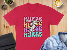 Load image into Gallery viewer, Red t-shirt with colorful "NURSE" text and floral lightning bolt graphics.
