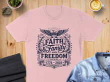 Load image into Gallery viewer, Pink t-shirt with "Faith & Family & Freedom 1776-2026" graphic.