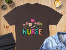Load image into Gallery viewer, Brown t-shirt with "NURSE" in colorful floral letters.