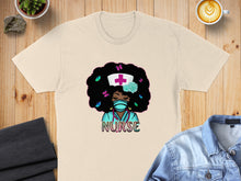 Load image into Gallery viewer, Nurse with afro, mask, and stethoscope on a t-shirt.