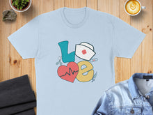 Load image into Gallery viewer, Light blue t-shirt with "Love" graphic featuring medical icons.