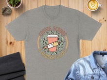 Load image into Gallery viewer, Gray t-shirt with "Coffee, Scrubs & Rubber Gloves" and syringe graphic.