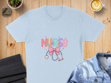 Load image into Gallery viewer, Light blue t-shirt with "NURSE" text and stethoscope graphic.