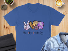 Load image into Gallery viewer, Blue t-shirt with "Peace love Radiology" text and graphic icons.