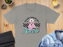 Load image into Gallery viewer, Grey t-shirt with "You can't scare me I'm a Nurse" ghost graphic.