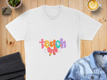 Load image into Gallery viewer, White t-shirt with colorful "teach" text and a glittery pink bow.