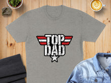 Load image into Gallery viewer, Gray t-shirt with distressed "TOP DAD" text in red and white wings.