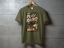 Load image into Gallery viewer, T-shirt with "Go Play Radio in the Park" graphic featuring ham radio equipment.