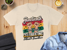 Load image into Gallery viewer, Juneteenth t-shirt celebrating black freedom with chained fists graphic.