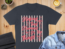 Load image into Gallery viewer, Dark blue t-shirt with pink text "Helping Tiny Humans Do Big Things".