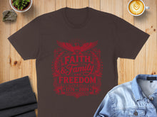 Load image into Gallery viewer, Brown t-shirt with red "Faith & Family and Freedom" graphic.