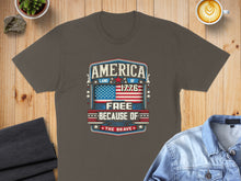 Load image into Gallery viewer, T-shirt with "America Land of the Free Because of the Brave" and 1776.